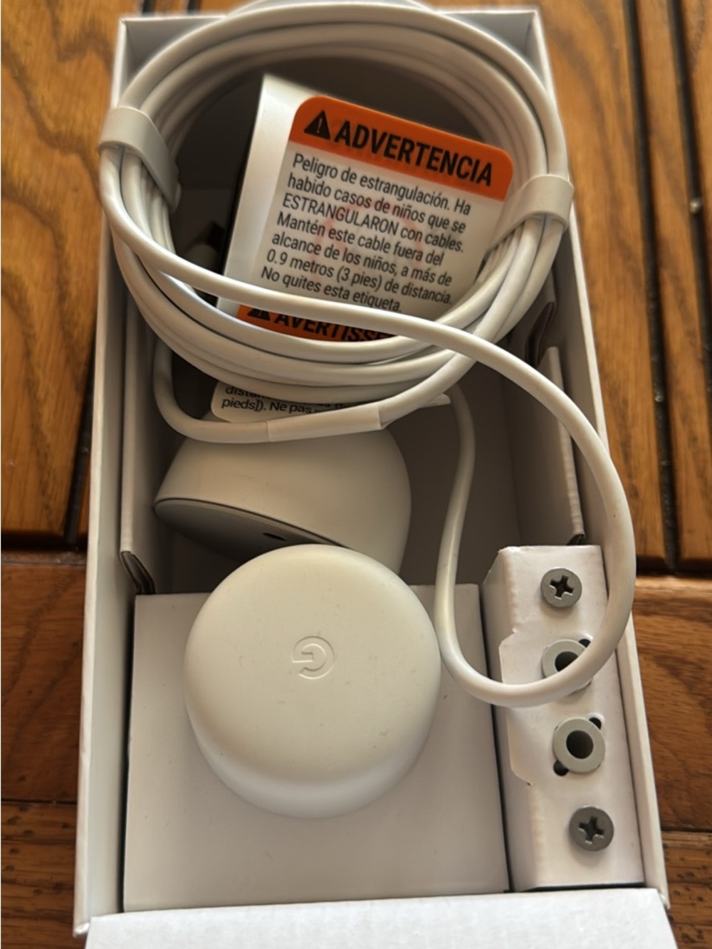google white Nest doorbell charger, cable and mounting kit